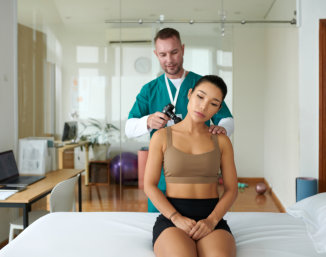 caregiver massagin woman